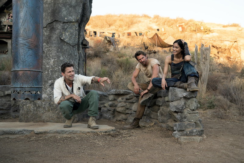 (L-R) Director/writer/producer Zack Snyder , Michiel Huisman as Gunnar and Sofia Boutella as Kora on the set of Rebel Moon. 